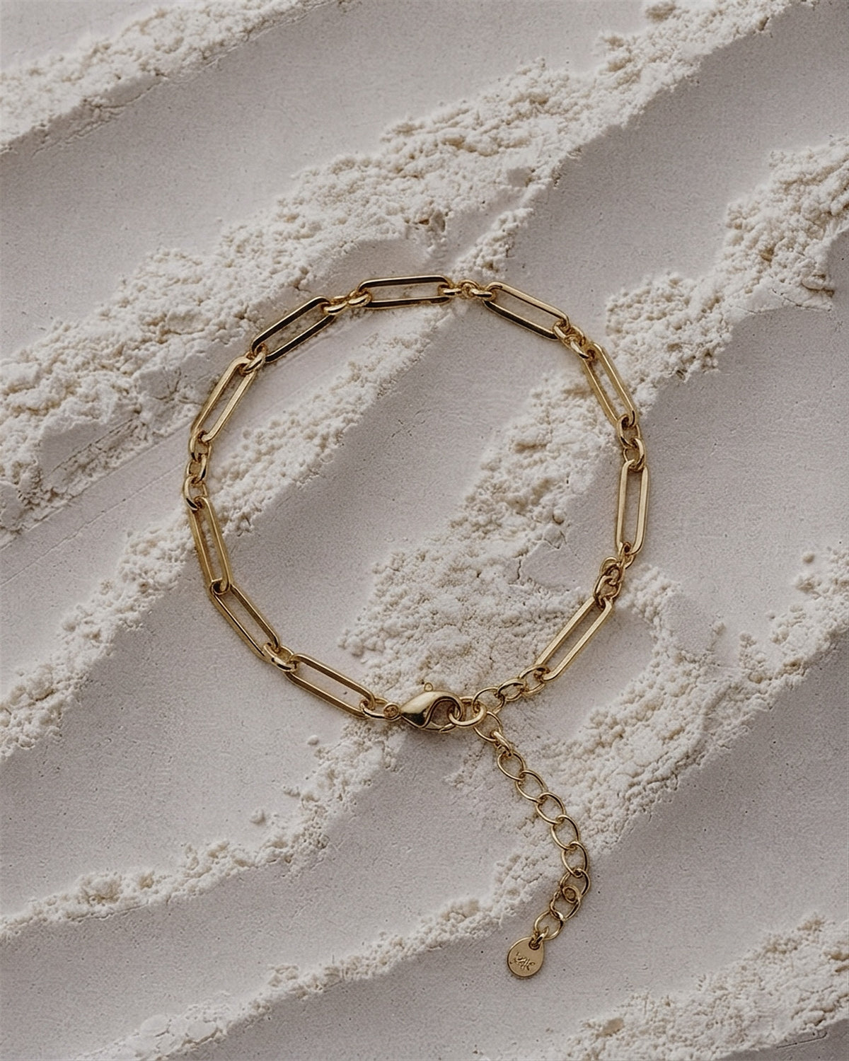 Elongated paperclip links with a lobster clasp and extension chain. Designed for bold dressers who want their bracelet to make a statement. 