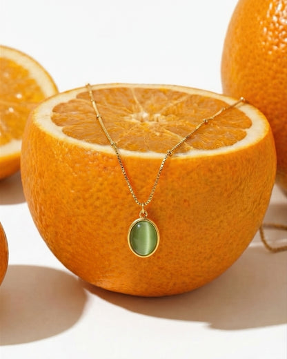 A translucent sea-green cabochon on a delicate satellite chain. Anti-tarnish and waterproof, The Sea Glass Pendant is built for effortless everyday wear. Shop Zorelle India.